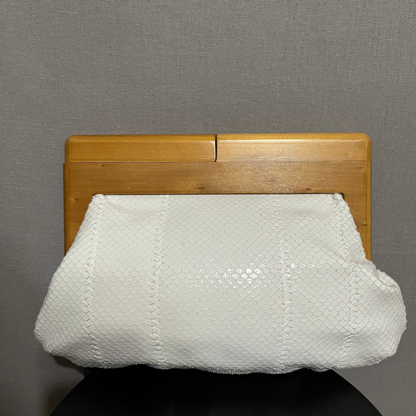 Sondra Roberts White and Tan Clutch