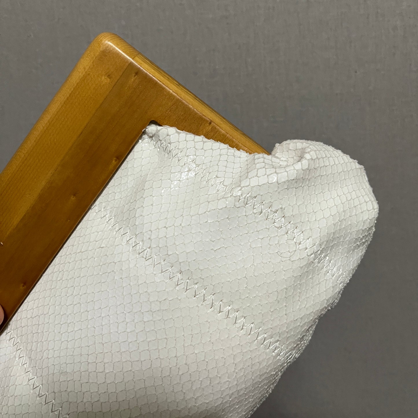 Sondra Roberts White and Tan Clutch